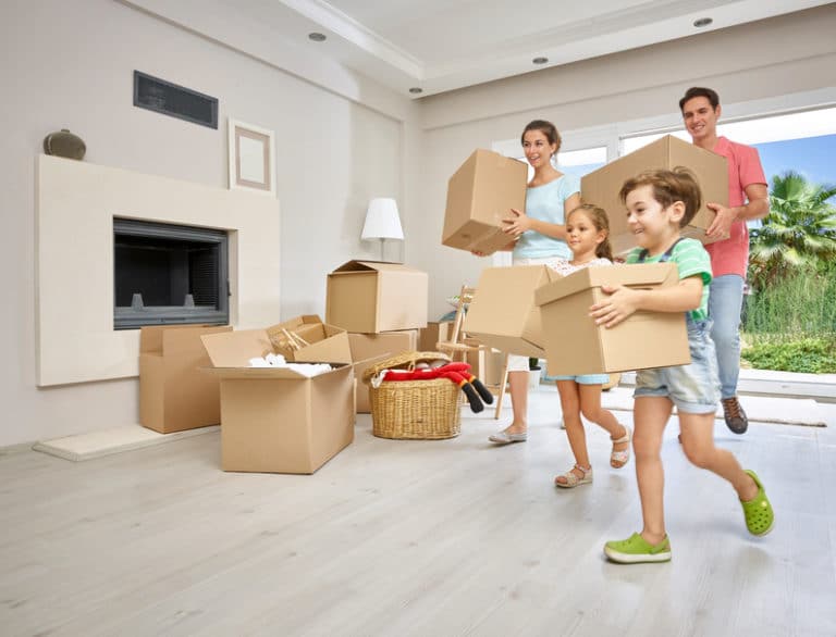 image of family moving boxes